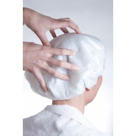 Bonnet de shampoing COCUNE pour le lavage des cheveux des patients - sans savons, sans eau, sans rinçage