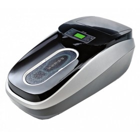 Zařízení orma pro automatické zakrytí obuvi hygienickou obuví